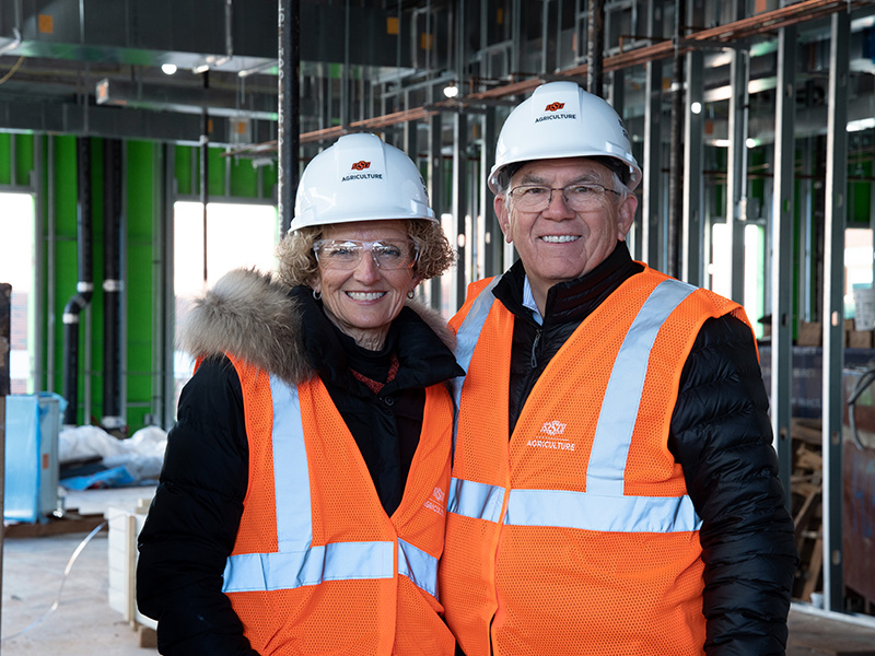 Kayleen and Larry Ferguson on the construction site
