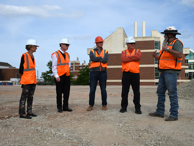 Kayleen Ferguson with crew on construction site