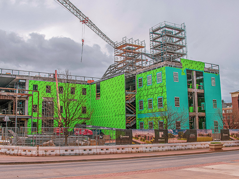 progress of windows being installed in the building