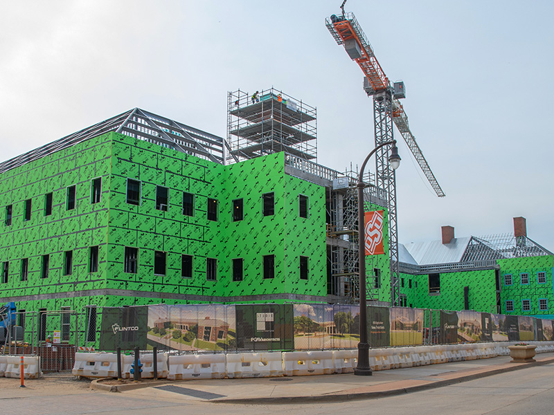 Work on the chimney on the north side of the New Frontiers building