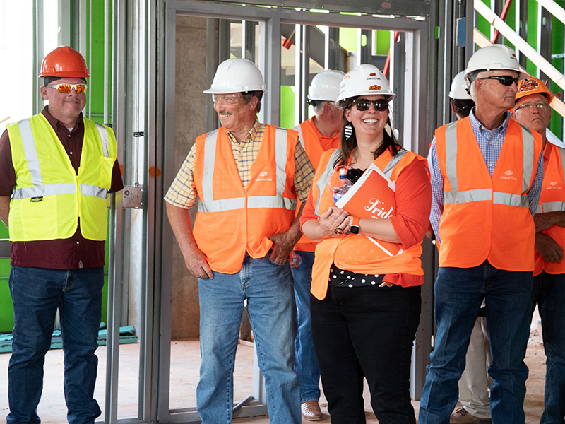 Tour participants inside building
