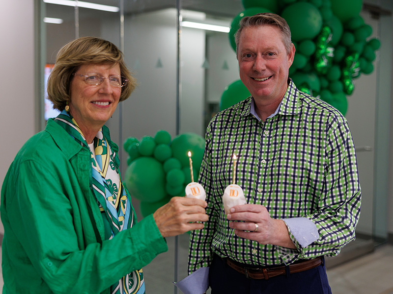 Doye and Lusk holding cupcakes during Extension day Doye and Lusk holding cupcakes during Extension day
