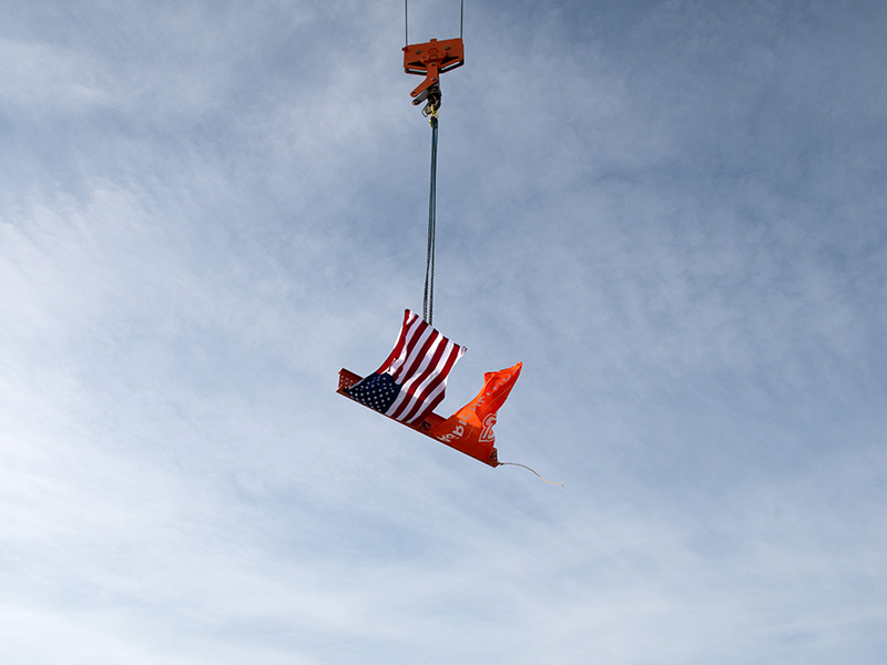 crane with signed beam in the sky