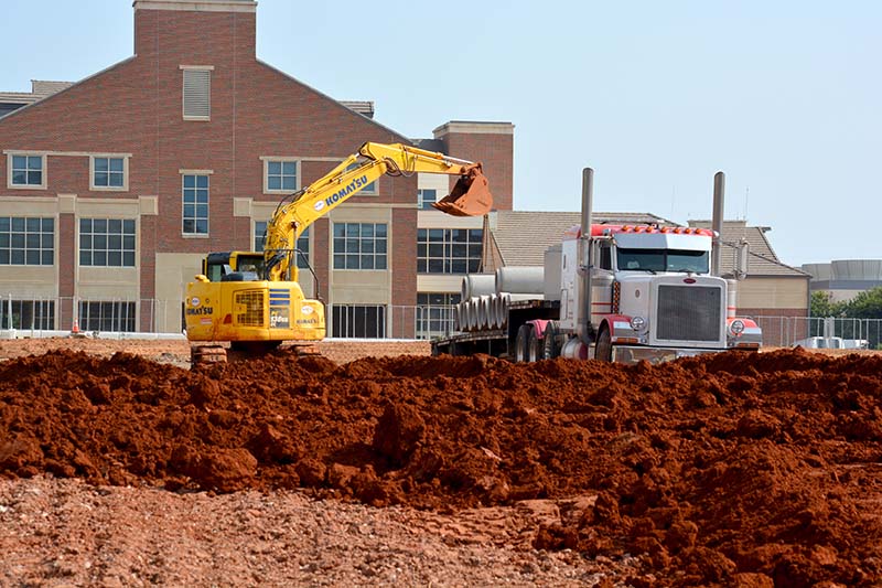 unloading material on construction site