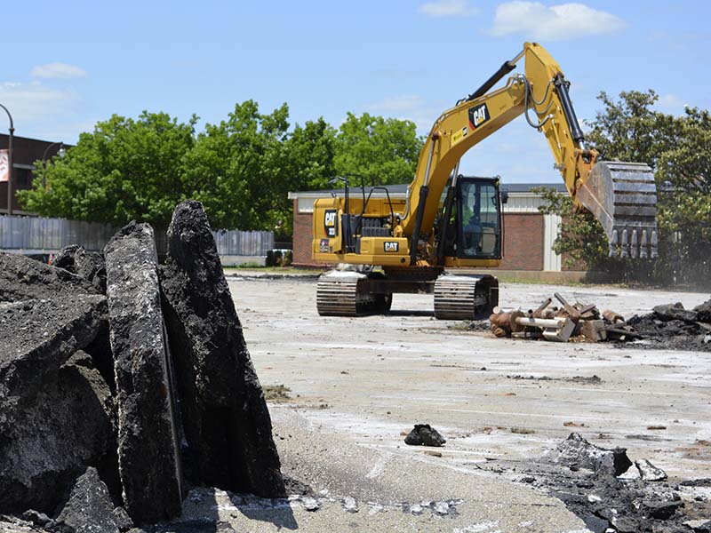 Moving debri during parking lot demolition