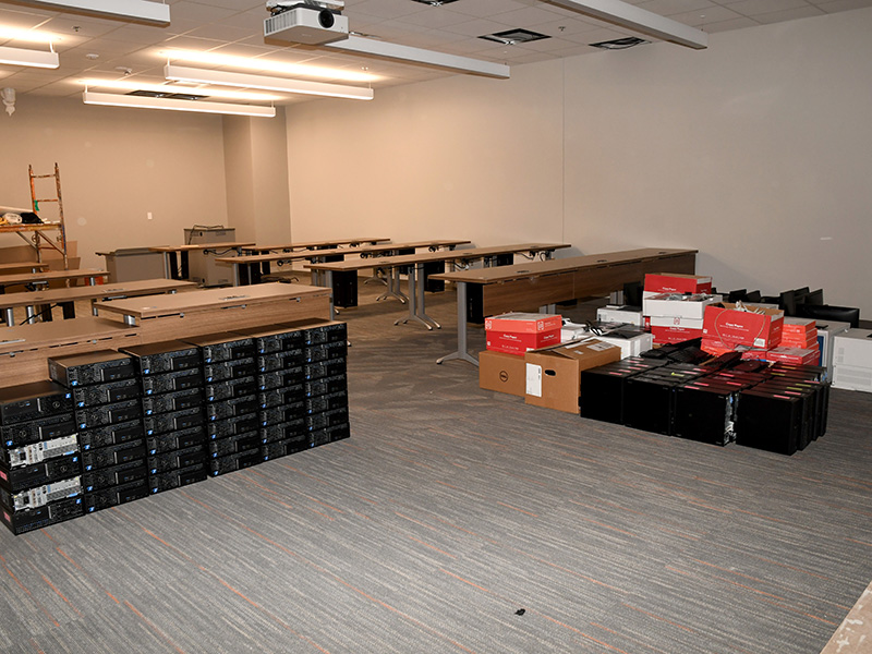 Stacks of computer equipment in computer lab