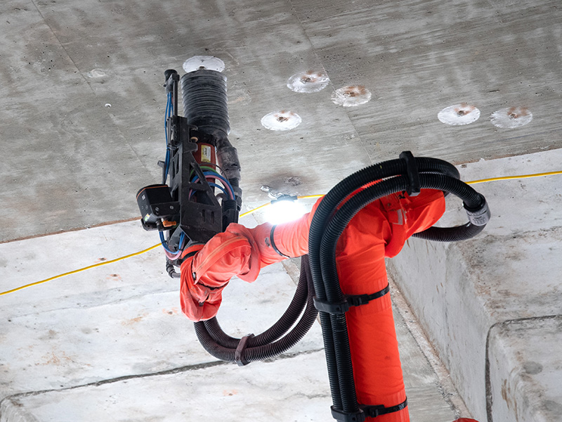JAIBOT robot drilling holes in concrete ceiling