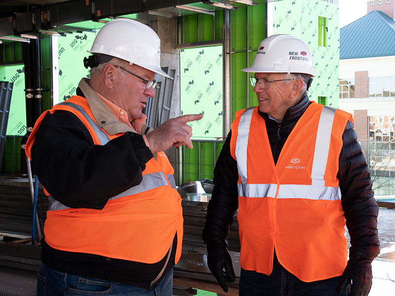 Barry Pollard and Larry Ferguson on construction site