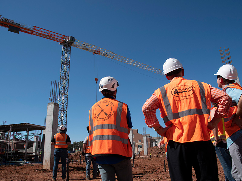 faculty and staff view the crane