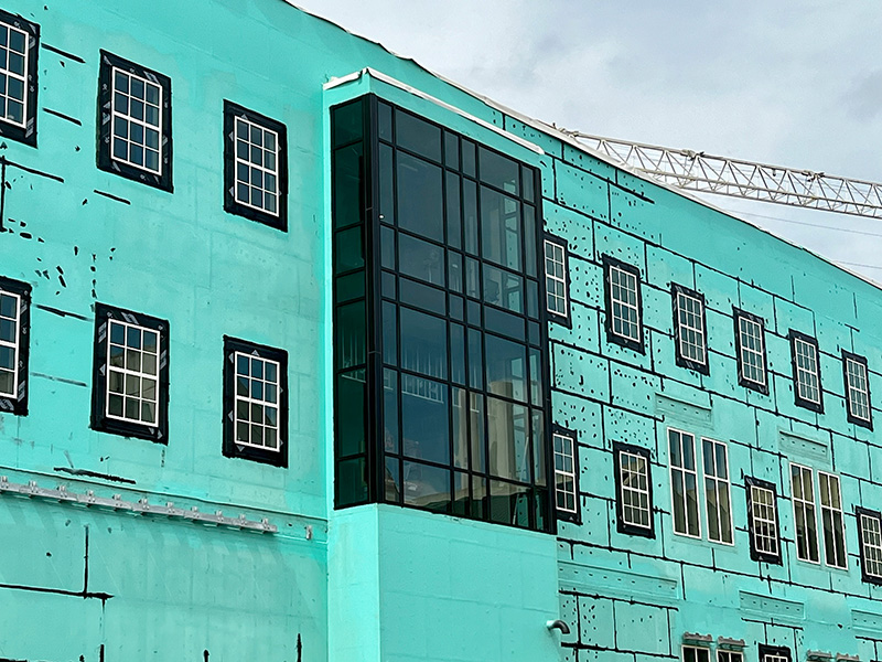 Curtain windows on east side of New Frontiers building